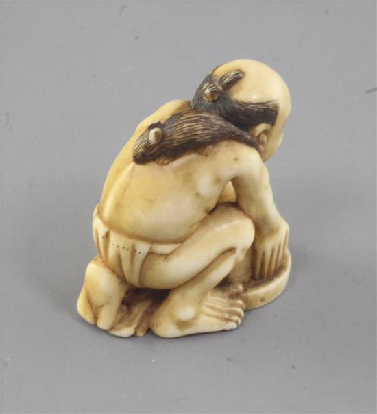 A Japanese ivory okimono of the disappointed ratcatcher, 19th century, signed Tomomitsu, 3.7cm high (no.572)